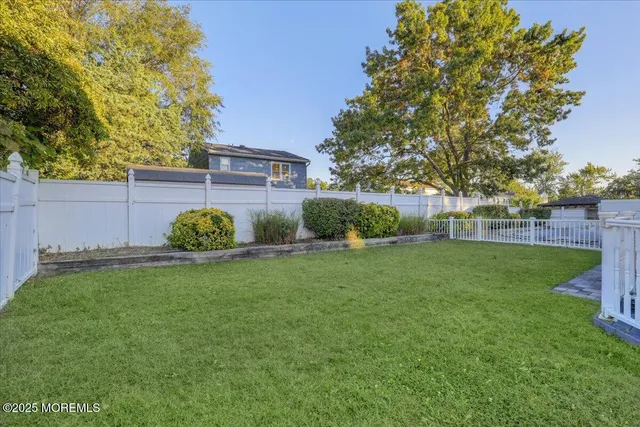 a view of a backyard with a garden