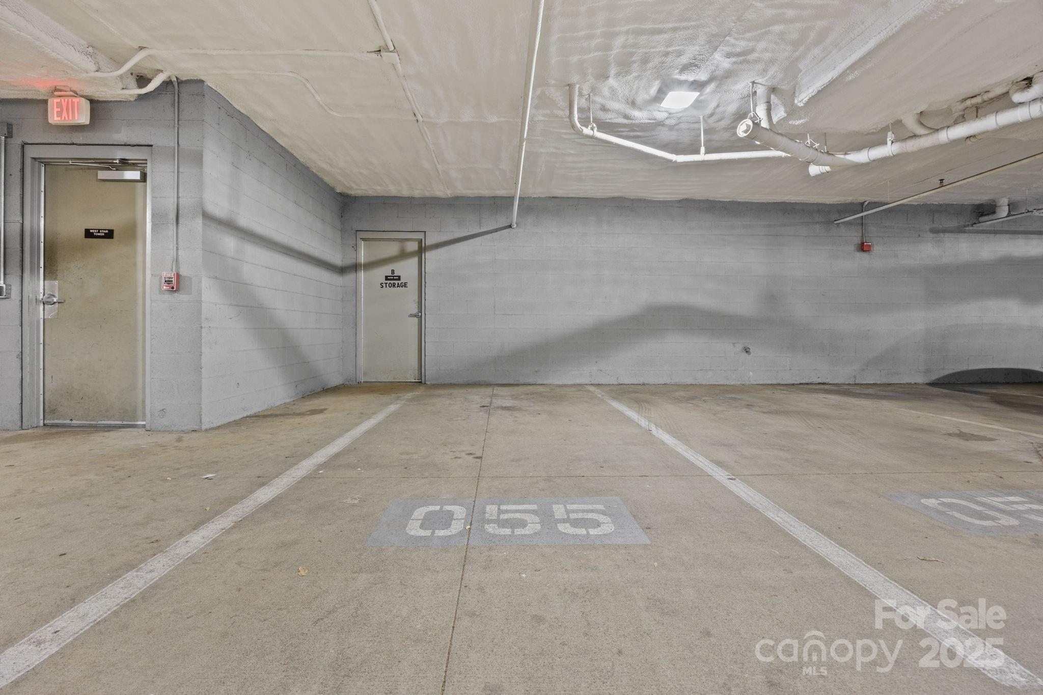 1000 East Woodlawn Road, Unit 413 Charlotte, NC 28209 - Photo 26 of 32 a view of a garage