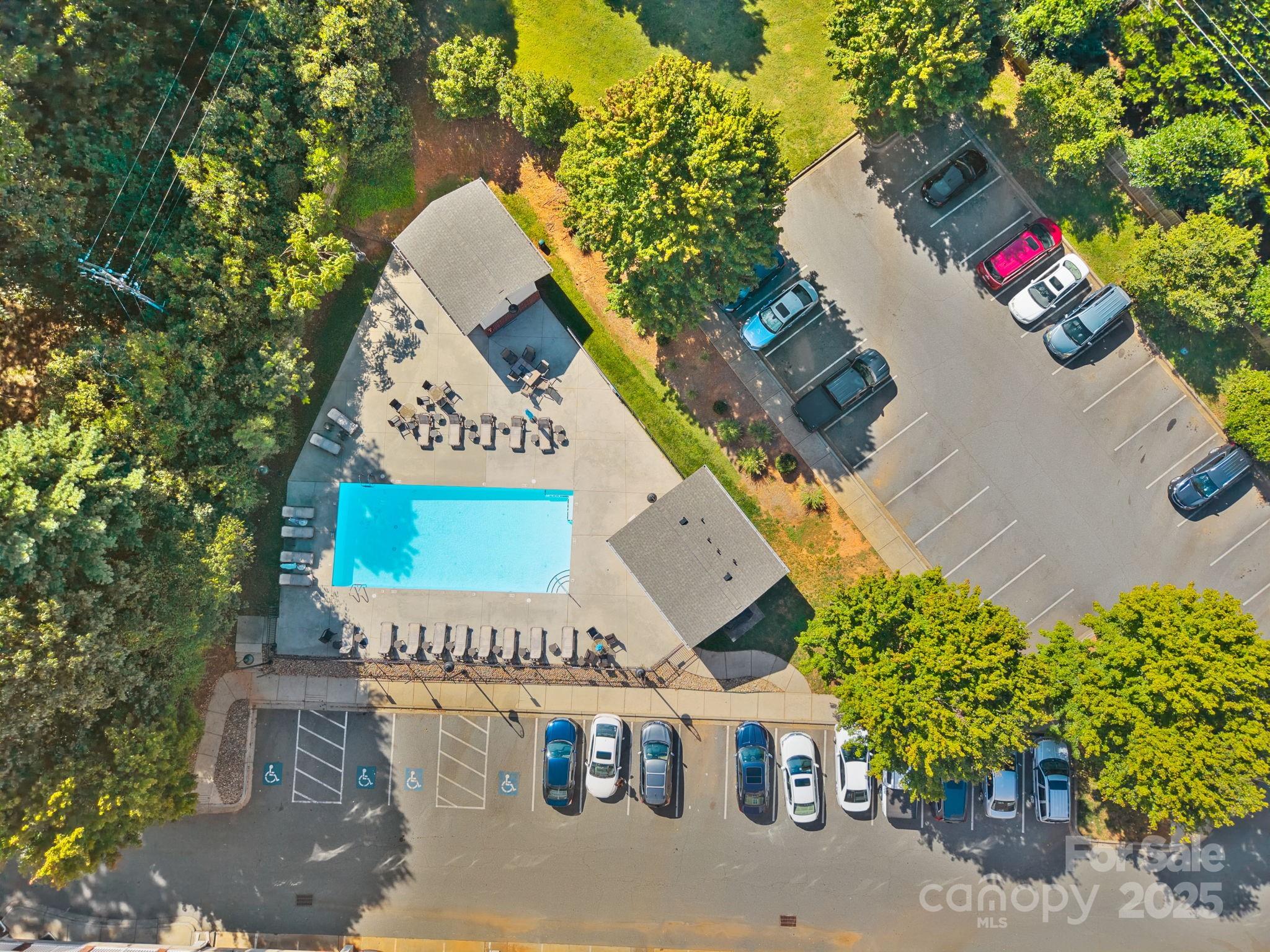 1000 East Woodlawn Road, Unit 413 Charlotte, NC 28209 - Photo 27 of 32 an aerial view of a house