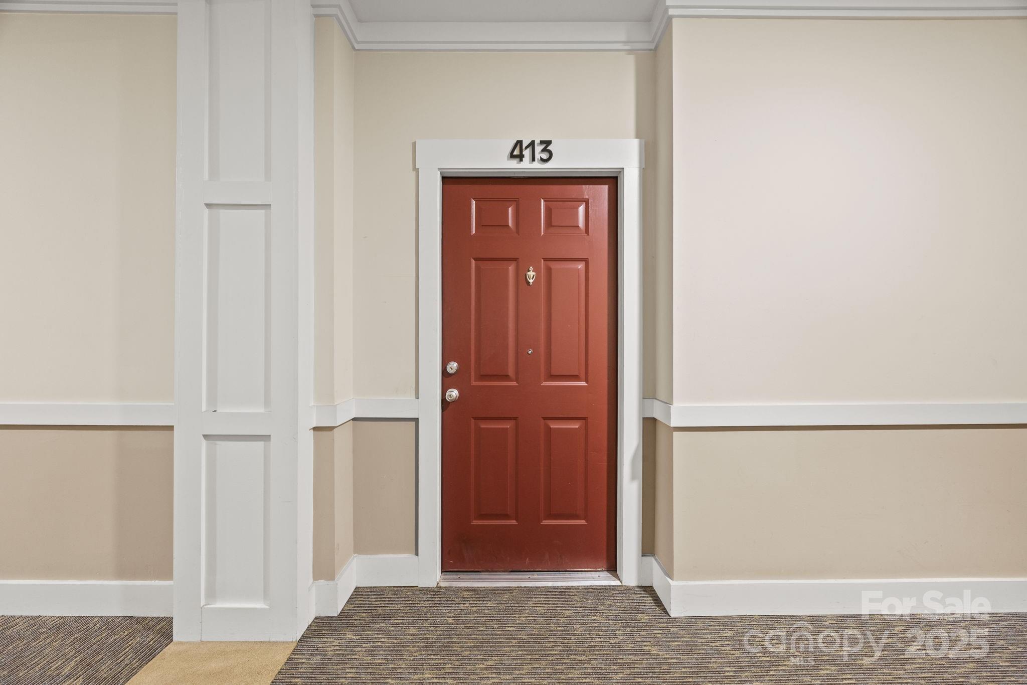 1000 East Woodlawn Road, Unit 413 Charlotte, NC 28209 - Photo 4 of 32 a view of front door