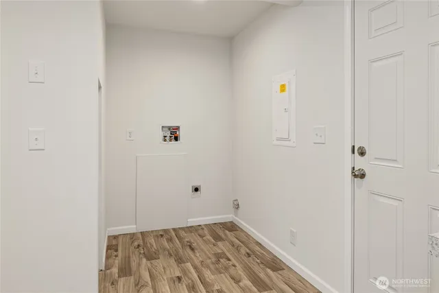 a view of a terrace with a chair and a fireplace