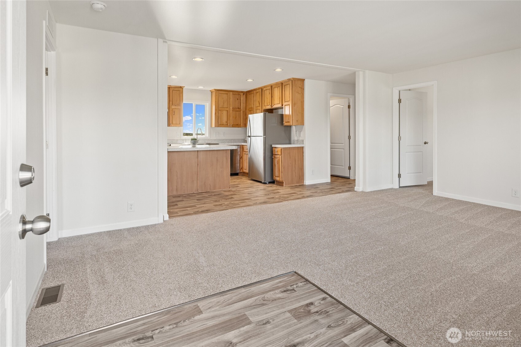 651 Highline Loop Cle Elum, WA 98922 - Photo 2 of 33 a view of a kitchen with refrigerator and white cabinets