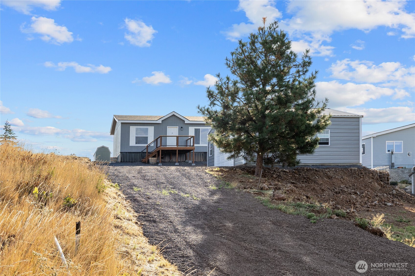 651 Highline Loop Cle Elum, WA 98922 - Photo 32 of 33 a front view of a house with a yard
