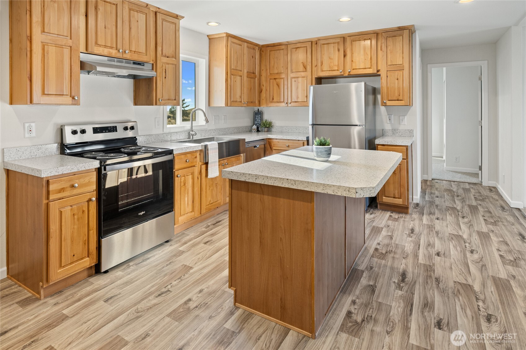 651 Highline Loop Cle Elum, WA 98922 - Photo 6 of 33 a kitchen with stainless steel appliances a stove a sink and a refrigerator