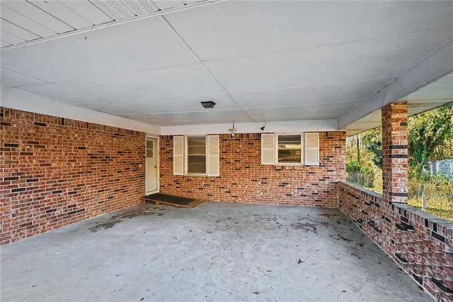 a view of room with wooden ceiling