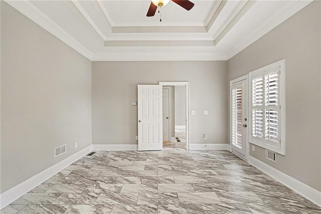 25 Inverleigh Row Covington, GA 30014 - Photo 12 of 28 a view of an empty room with a window