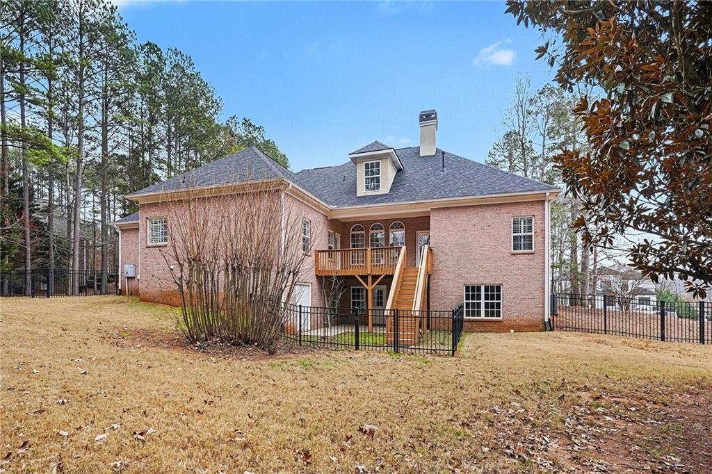 25 Inverleigh Row Covington, GA 30014 - Photo 25 of 28 a front view of a house with a yard and garage