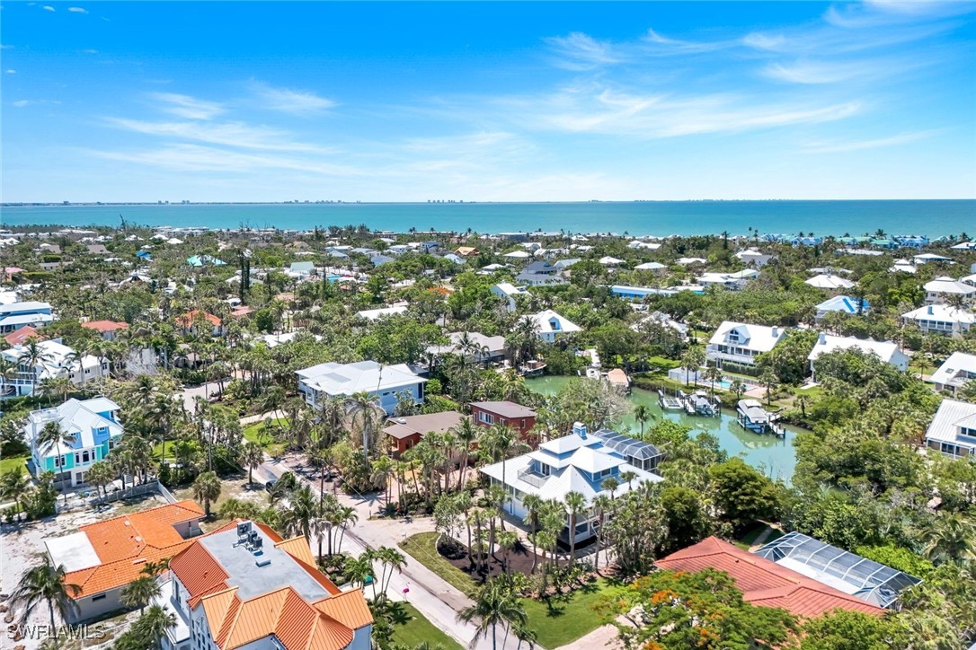 513 Lighthouse Way Sanibel, FL 33957 - Photo 2 of 44 an aerial view of residential houses with outdoor space