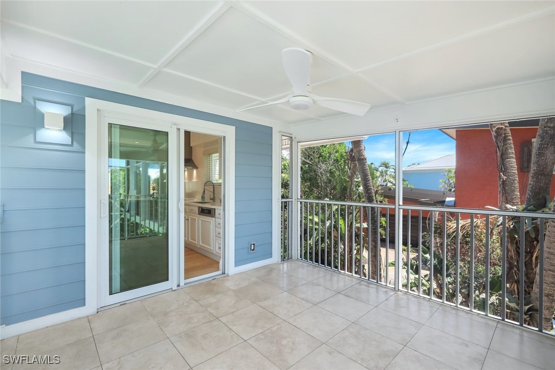 513 Lighthouse Way Sanibel, FL 33957 - Photo 23 of 44 a view of a balcony with wooden floor and outdoor space