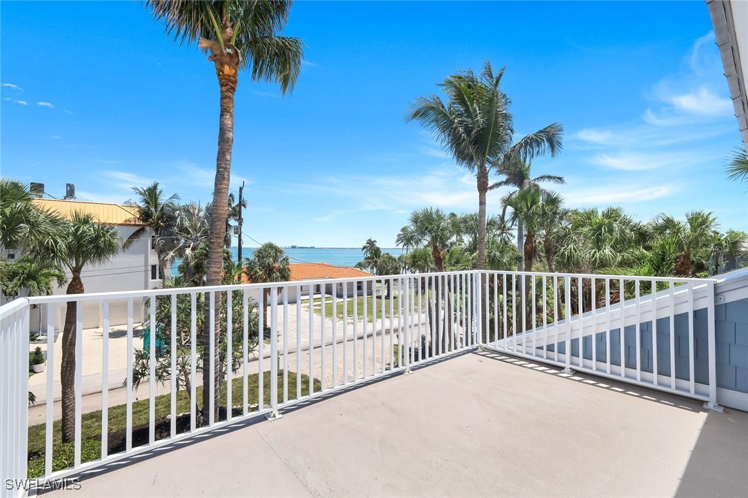 513 Lighthouse Way Sanibel, FL 33957 - Photo 24 of 44 a view of a balcony with a tree