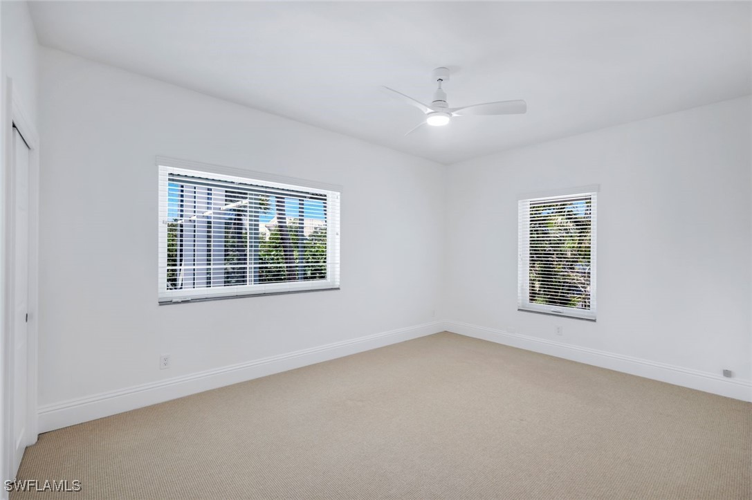 513 Lighthouse Way Sanibel, FL 33957 - Photo 30 of 44 a view of an empty room with a window
