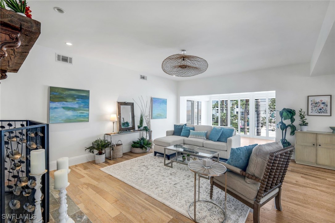 513 Lighthouse Way Sanibel, FL 33957 - Photo 6 of 44 a view of a livingroom with furniture and a table