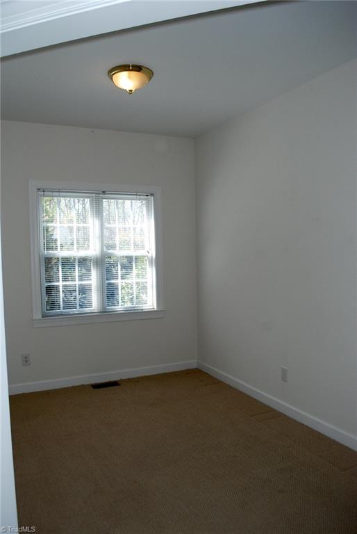 5301 Ridge Trail Road Summerfield, NC 27358 - Photo 16 of 30 Freshly painted sitting room off nursery could also serve as an office or nursery.