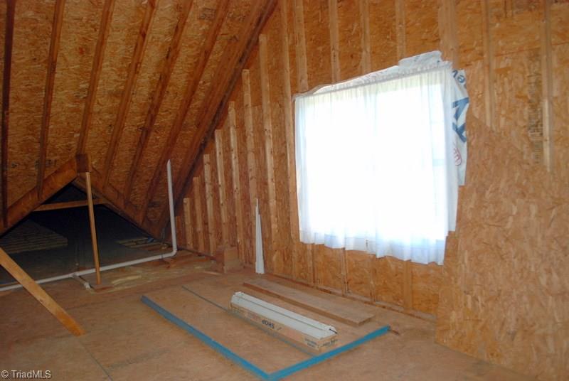 5301 Ridge Trail Road Summerfield, NC 27358 - Photo 22 of 30 With windows on either end, this could easily be finished off to make a wonderful living space OR just kept as is for oodles of storage.