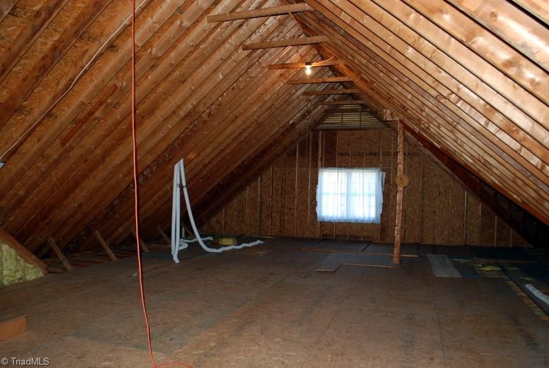5301 Ridge Trail Road Summerfield, NC 27358 - Photo 23 of 30 There's 1,235 sq. ft. of expandable space in the walk-up attic.
