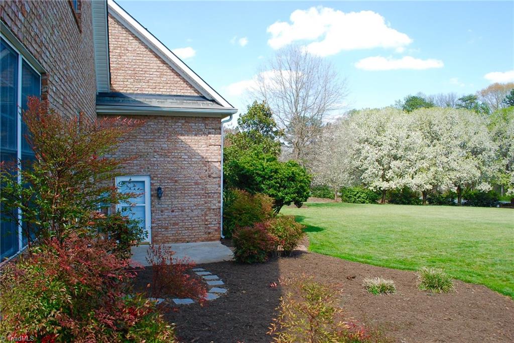 5301 Ridge Trail Road Summerfield, NC 27358 - Photo 25 of 30 Side view. Service door to garage