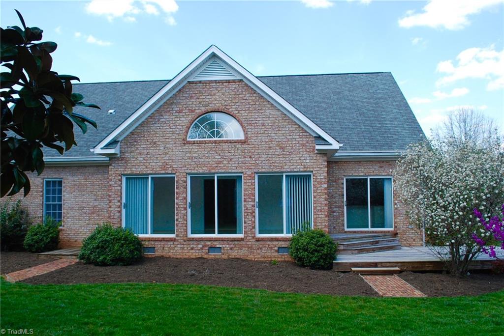 5301 Ridge Trail Road Summerfield, NC 27358 - Photo 29 of 30 Rear view of sunroom.