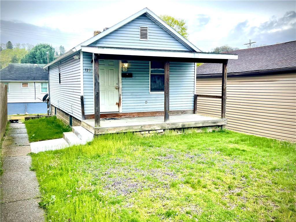 729 North Grant Avenue Kittanning, PA 16201 - Photo 1 of 15 a front view of a house with a yard