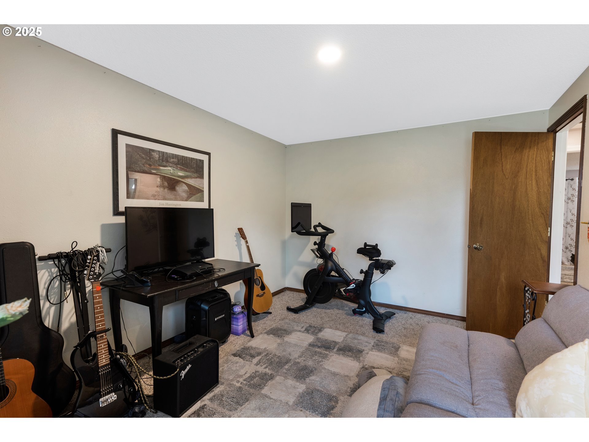 11398 Southwest Ironwood Loop Portland, OR 97223 - Photo 25 of 44 a living room with furniture and a flat screen tv