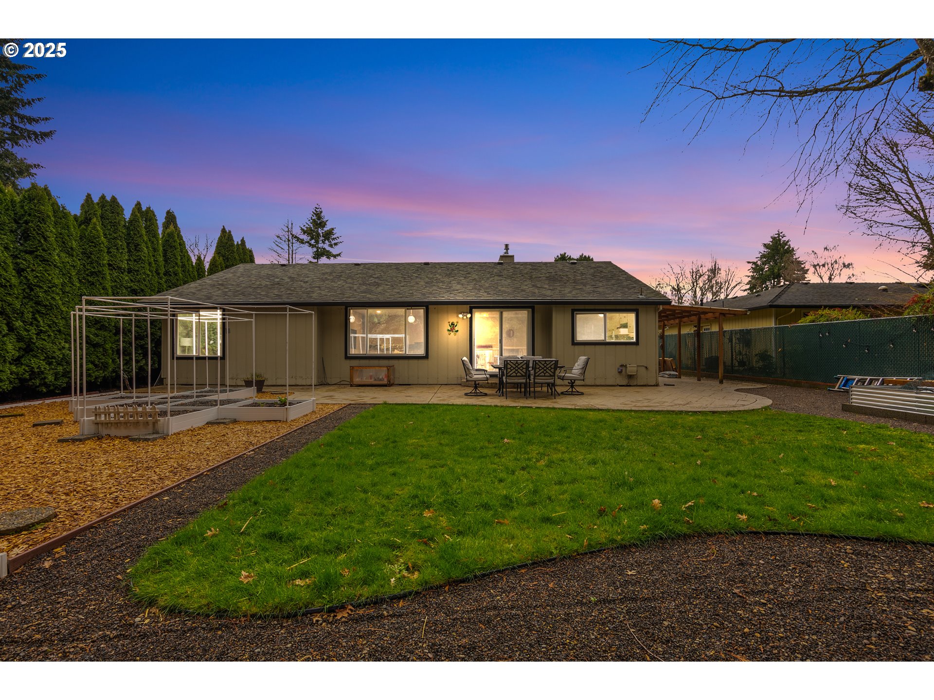11398 Southwest Ironwood Loop Portland, OR 97223 - Photo 43 of 44 a front view of a house with a garden