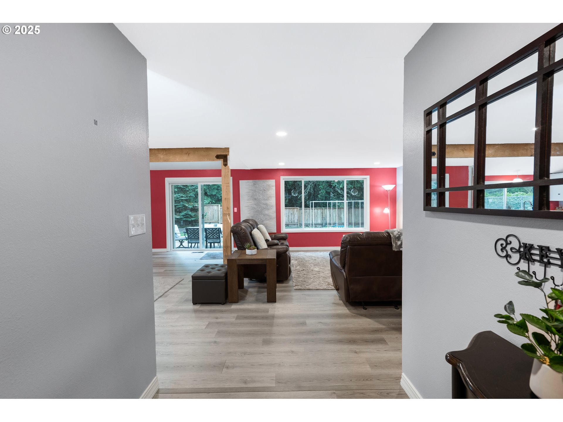 11398 Southwest Ironwood Loop Portland, OR 97223 - Photo 5 of 44 a living room with furniture and a large window