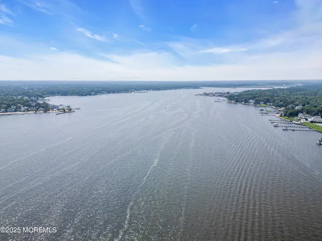 an aerial view of a houses and an outdoor space