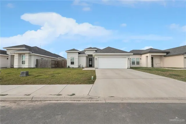 front view of a house and a yard