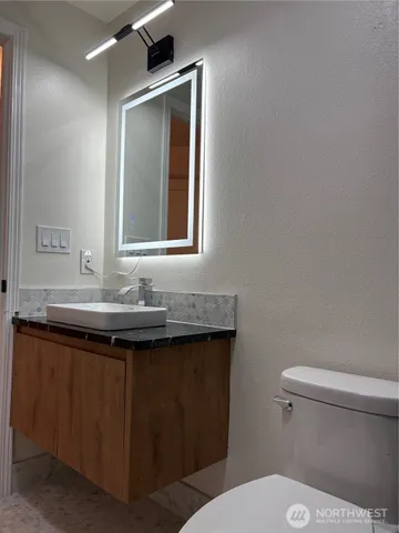 a bathroom with a sink and a toilet