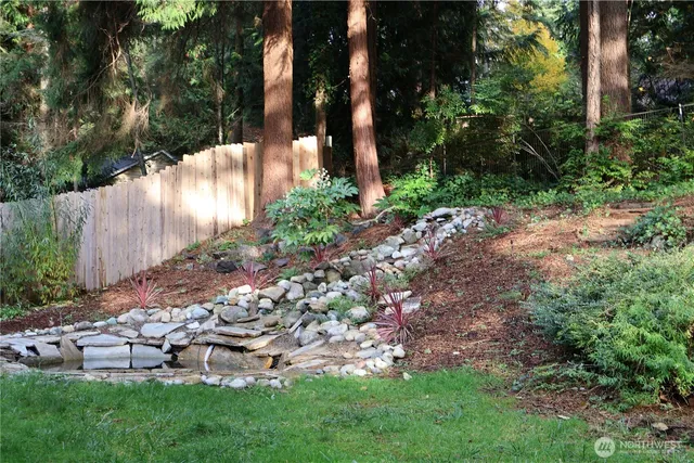 a view of backyard with green space