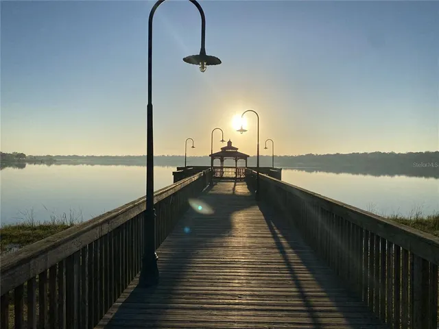 a view of a balcony next to a lake view