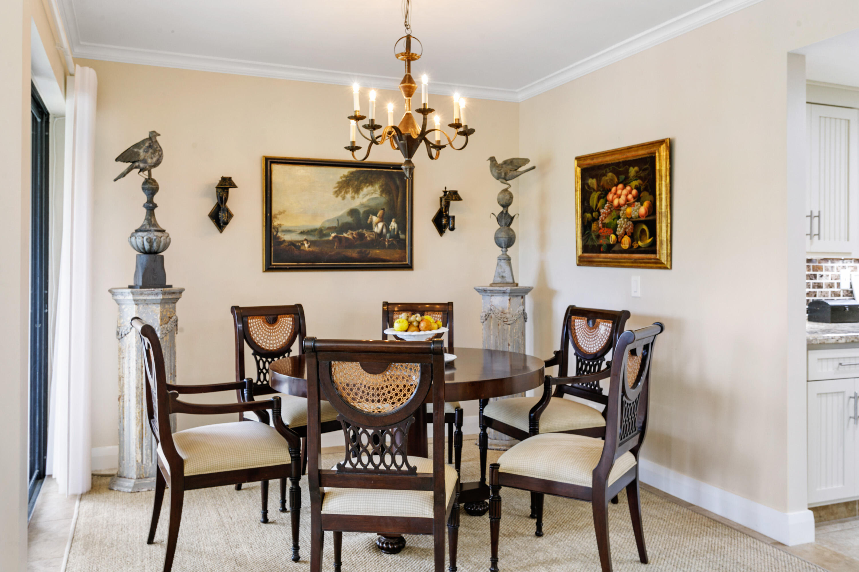 1109 Marine Way East, Unit L2R North Palm Beach, FL 33408 - Photo 6 of 27 a view of a dining room with furniture and a chandelier