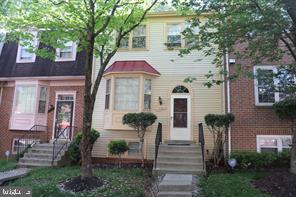 13242 Stravinsky Terrace Silver Spring, MD 20904 - Photo 1 of 11 a front view of a house with garden