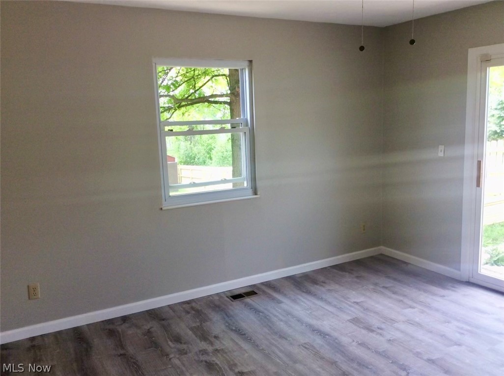 10071 Hazelton Road Streetsboro, OH 44241 - Photo 15 of 16 Empty room with hardwood / wood-style floors