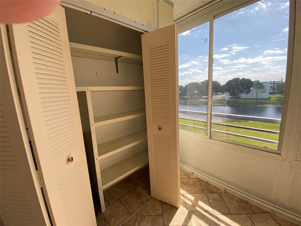 4101 Oakridge V, Unit 4101 Deerfield Beach, FL 33442 - Photo 17 of 42 a view of outdoor space