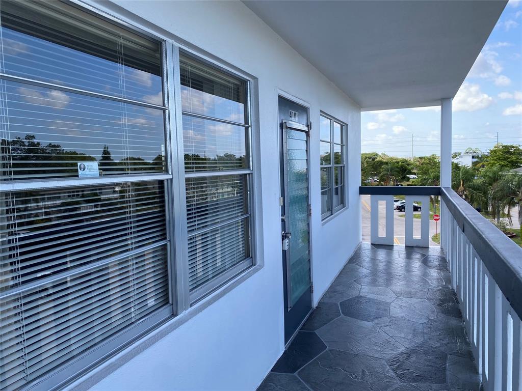 4101 Oakridge V, Unit 4101 Deerfield Beach, FL 33442 - Photo 21 of 42 a view of balcony