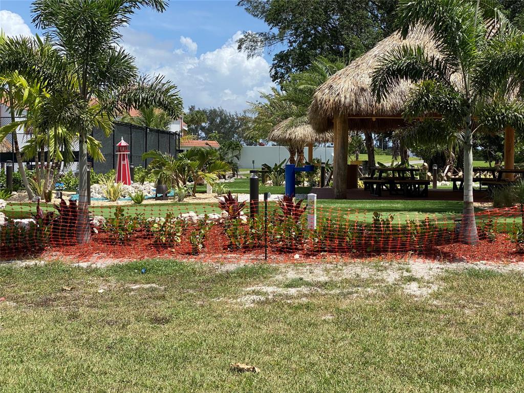 4101 Oakridge V, Unit 4101 Deerfield Beach, FL 33442 - Photo 32 of 42 a view of a park with of a house