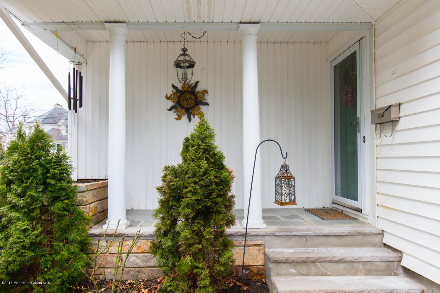 634 Rankin Road Brielle, NJ 08730 - Photo 2 of 23 a front view of a house with garden