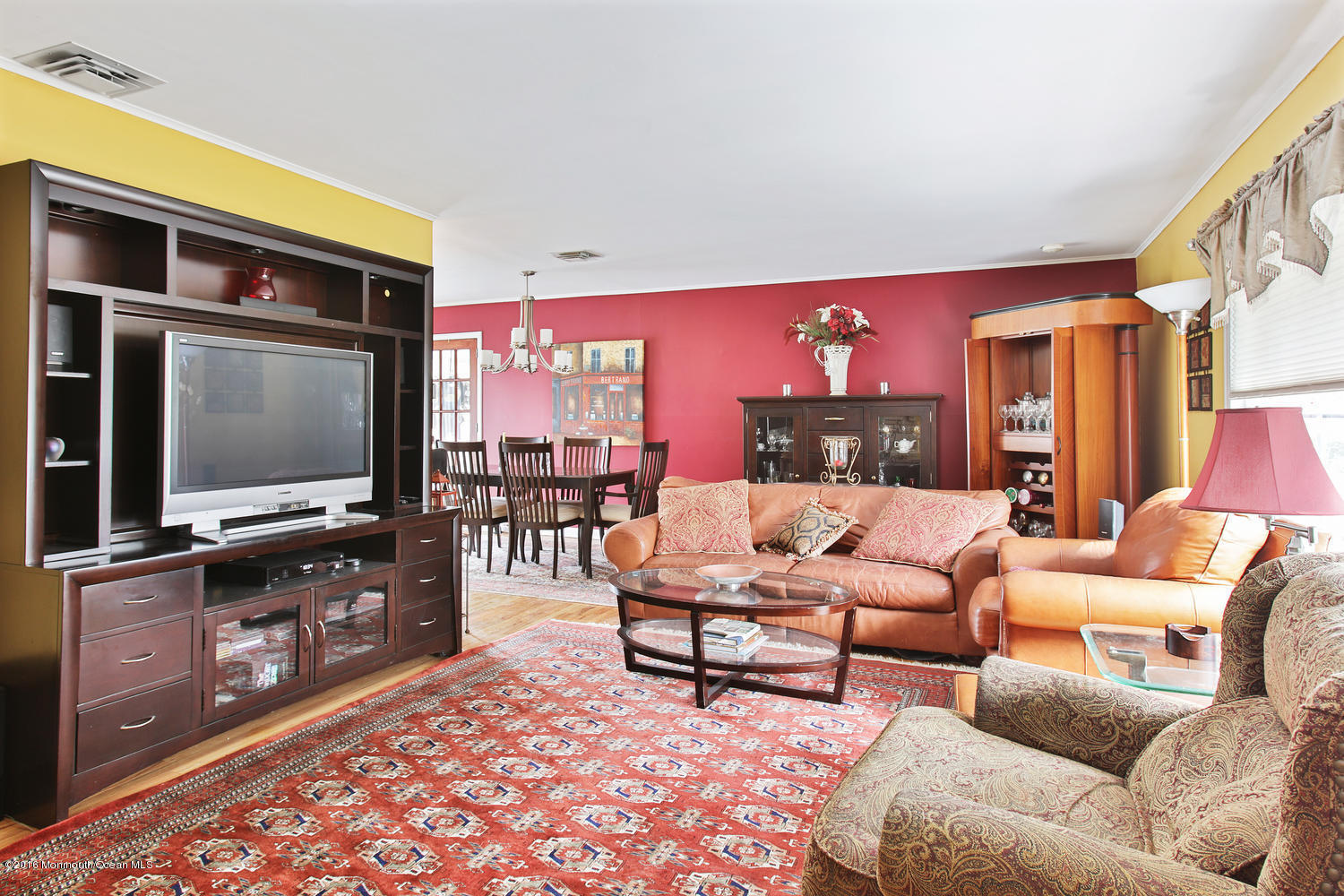 634 Rankin Road Brielle, NJ 08730 - Photo 6 of 23 a living room with furniture and a flat screen tv
