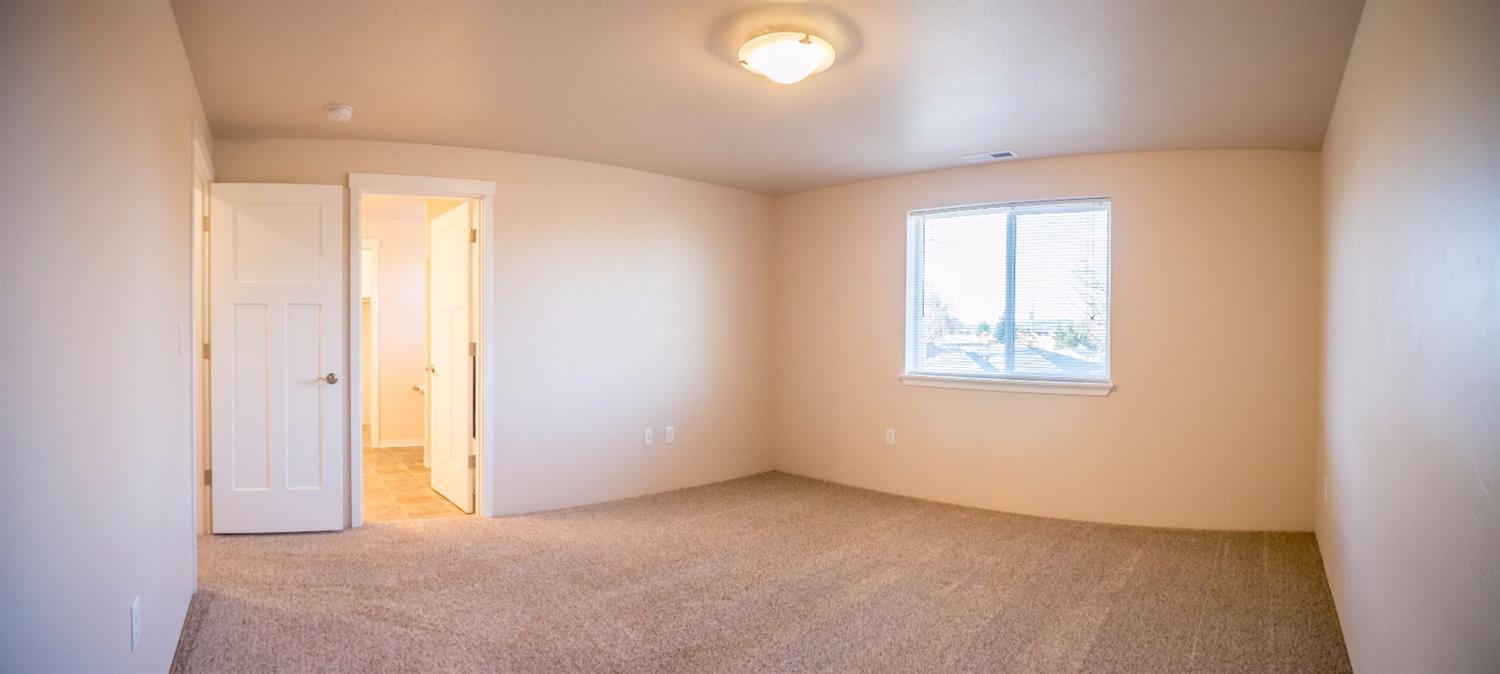 240 Maple Street Central Point, OR 97502 - Photo 19 of 35 an empty room with windows