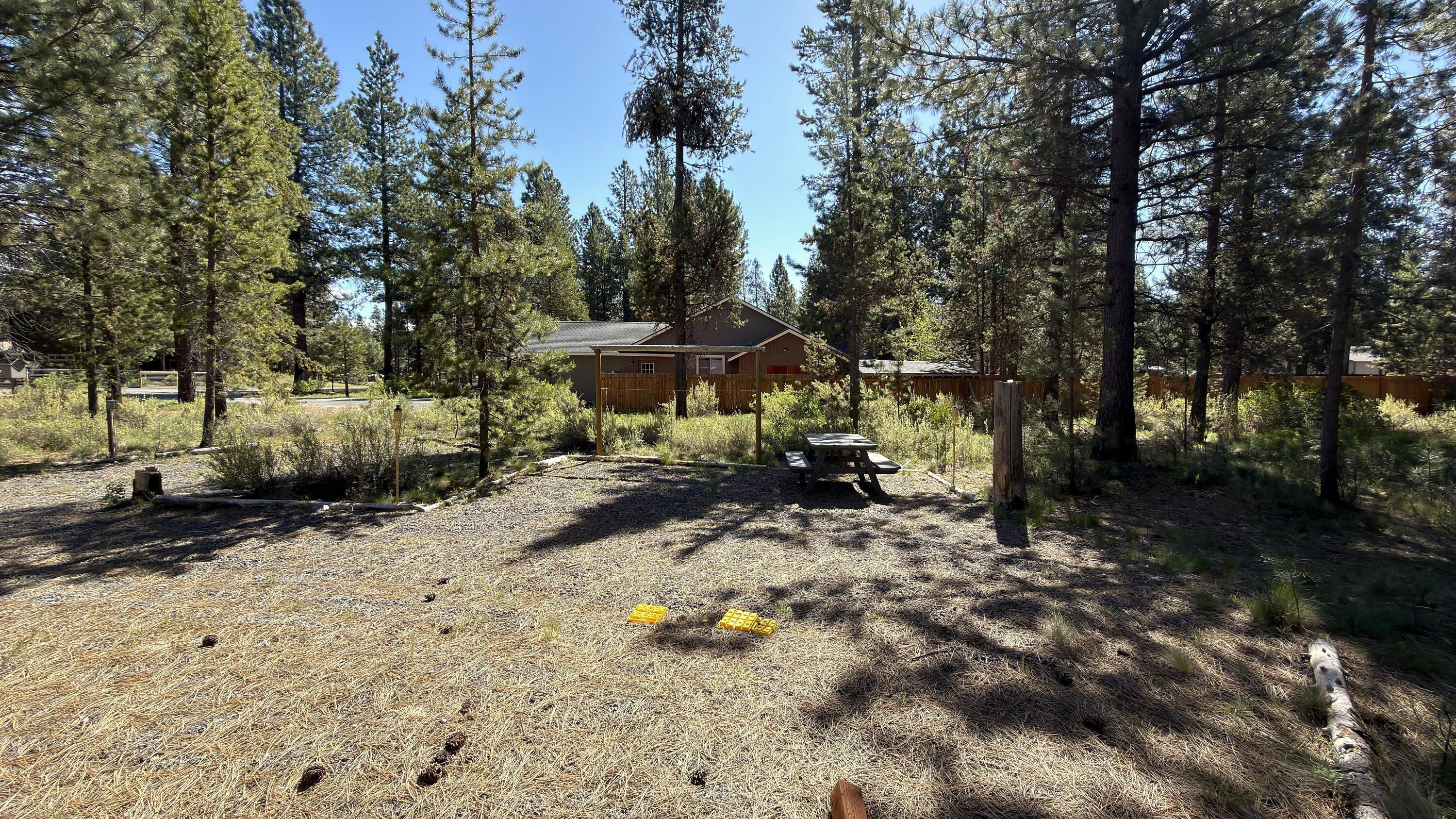16999 Jacinto Road Bend, OR 97707 - Photo 11 of 38 a view of a park with large trees