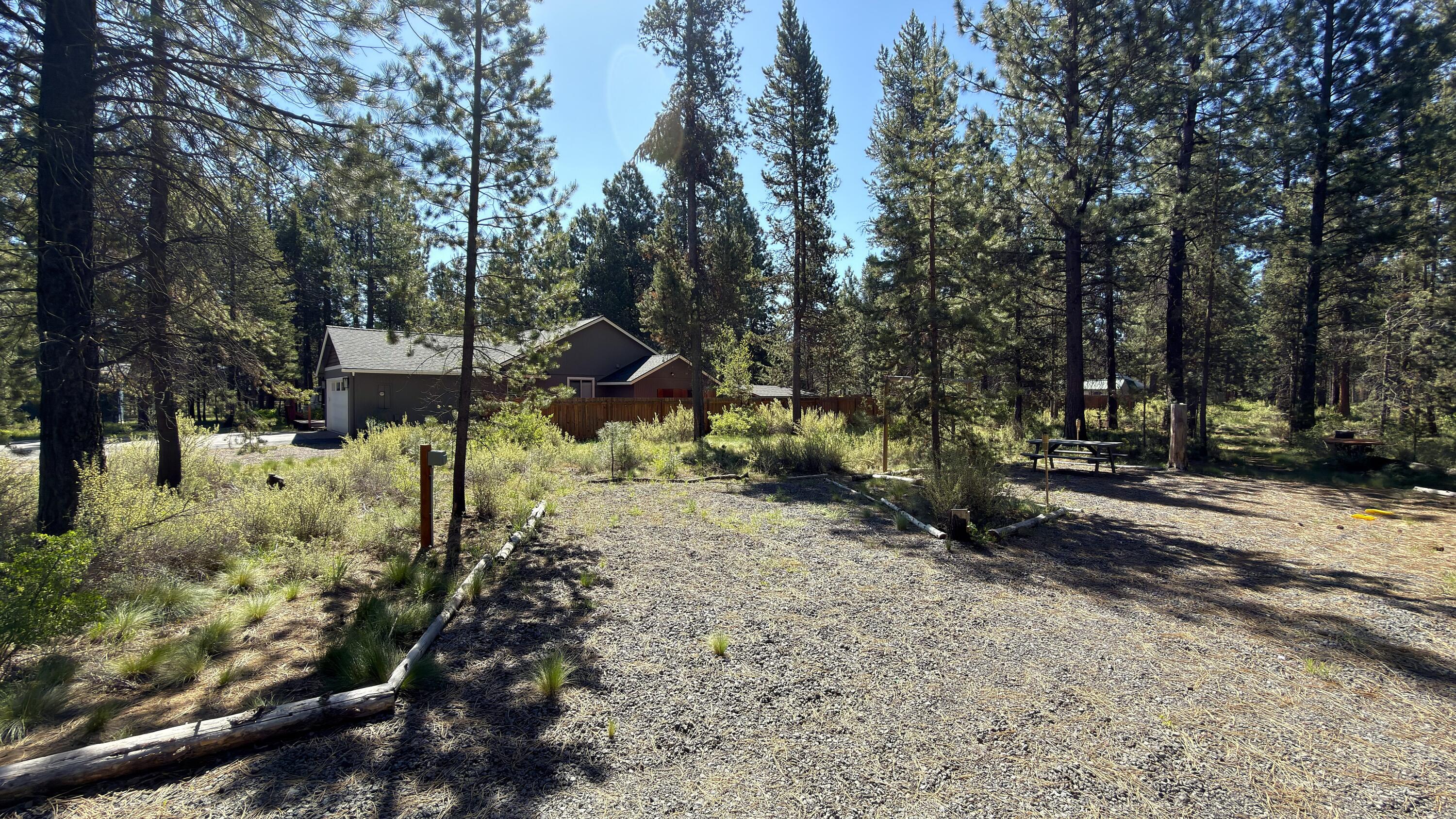 16999 Jacinto Road Bend, OR 97707 - Photo 13 of 38 a view of a park with large trees