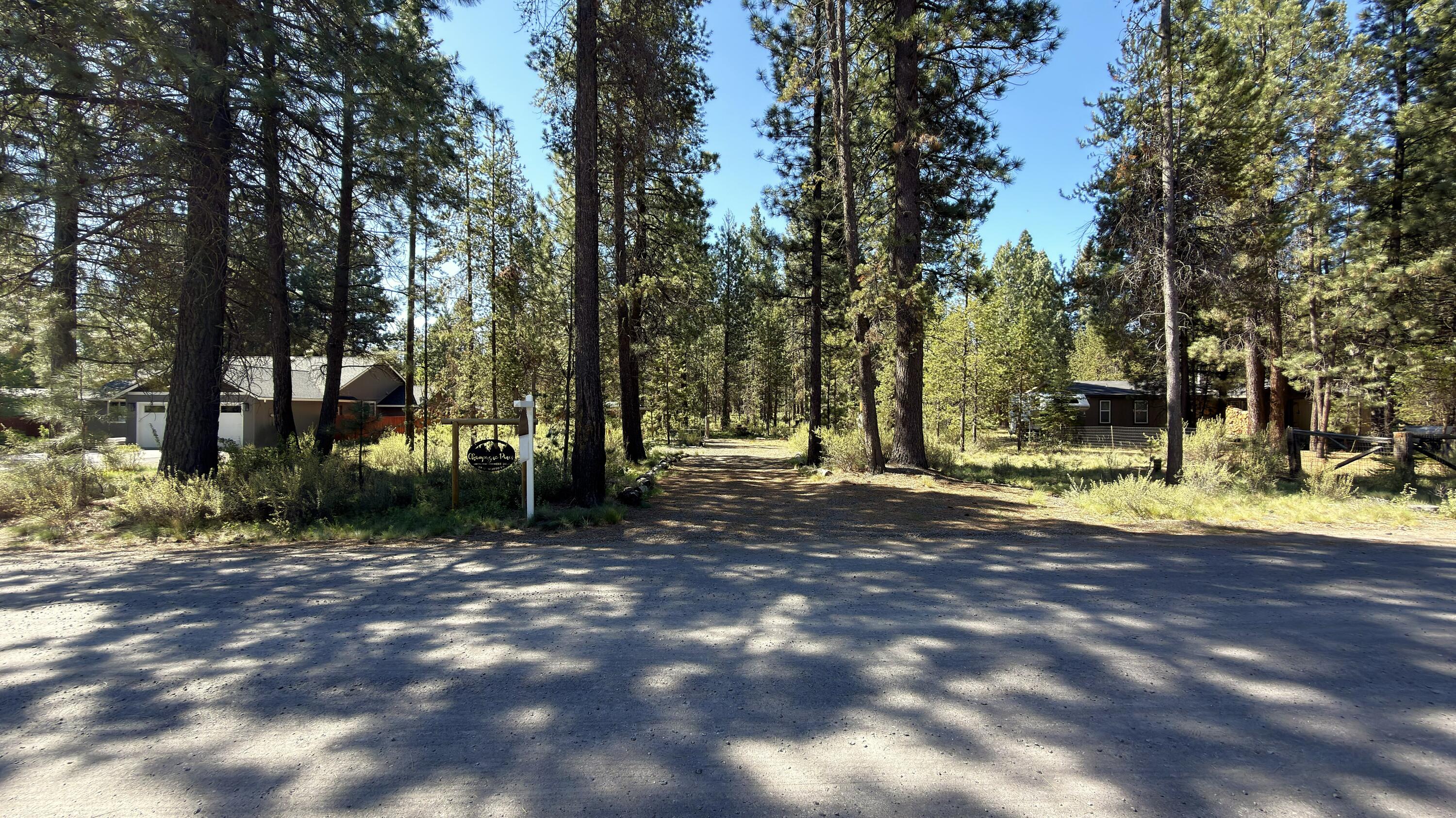 16999 Jacinto Road Bend, OR 97707 - Photo 14 of 38 a view of a tree in the middle of a yard