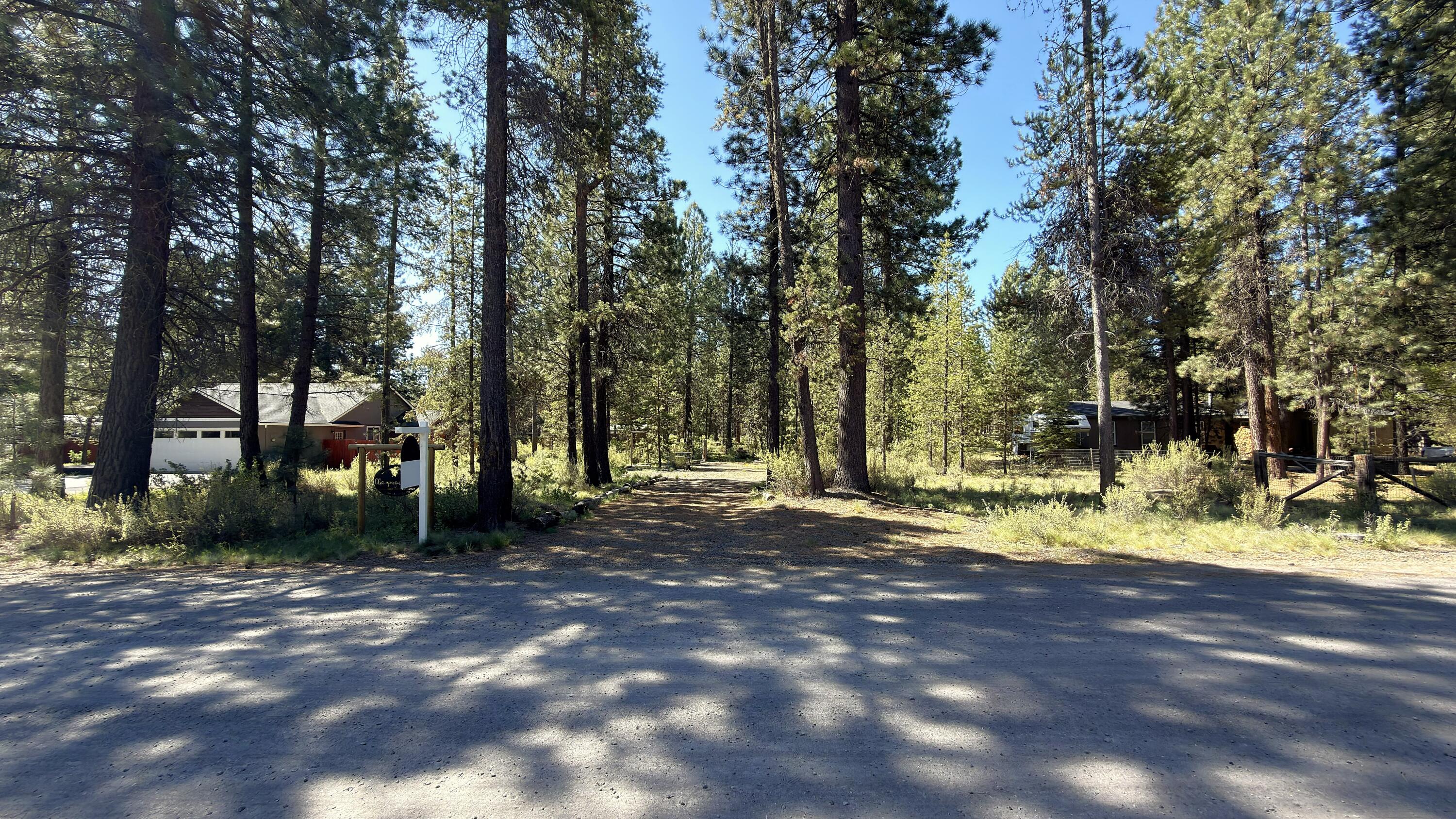 16999 Jacinto Road Bend, OR 97707 - Photo 15 of 38 a view of a yard with palm trees