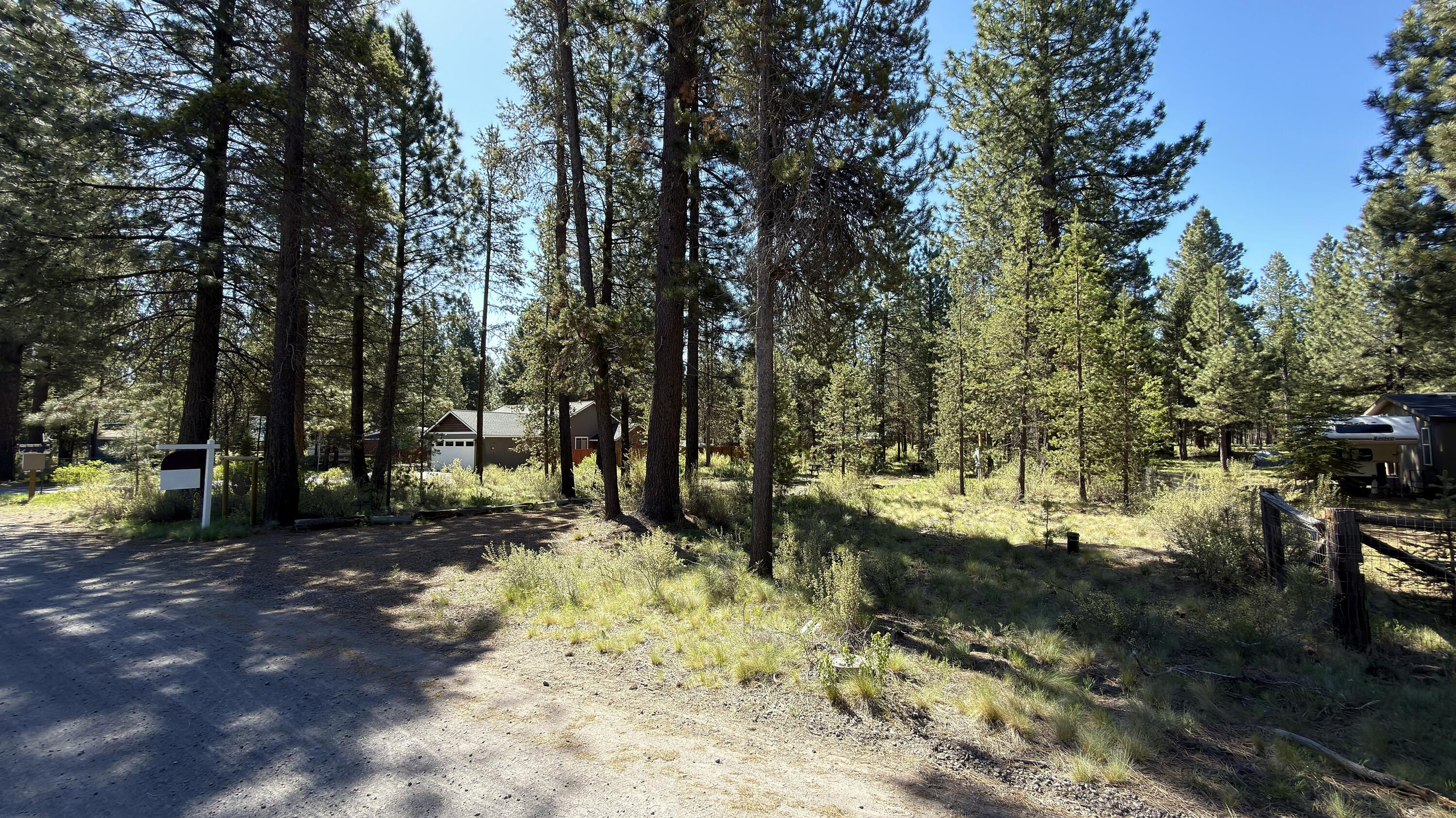 16999 Jacinto Road Bend, OR 97707 - Photo 16 of 38 a view of a forest with trees