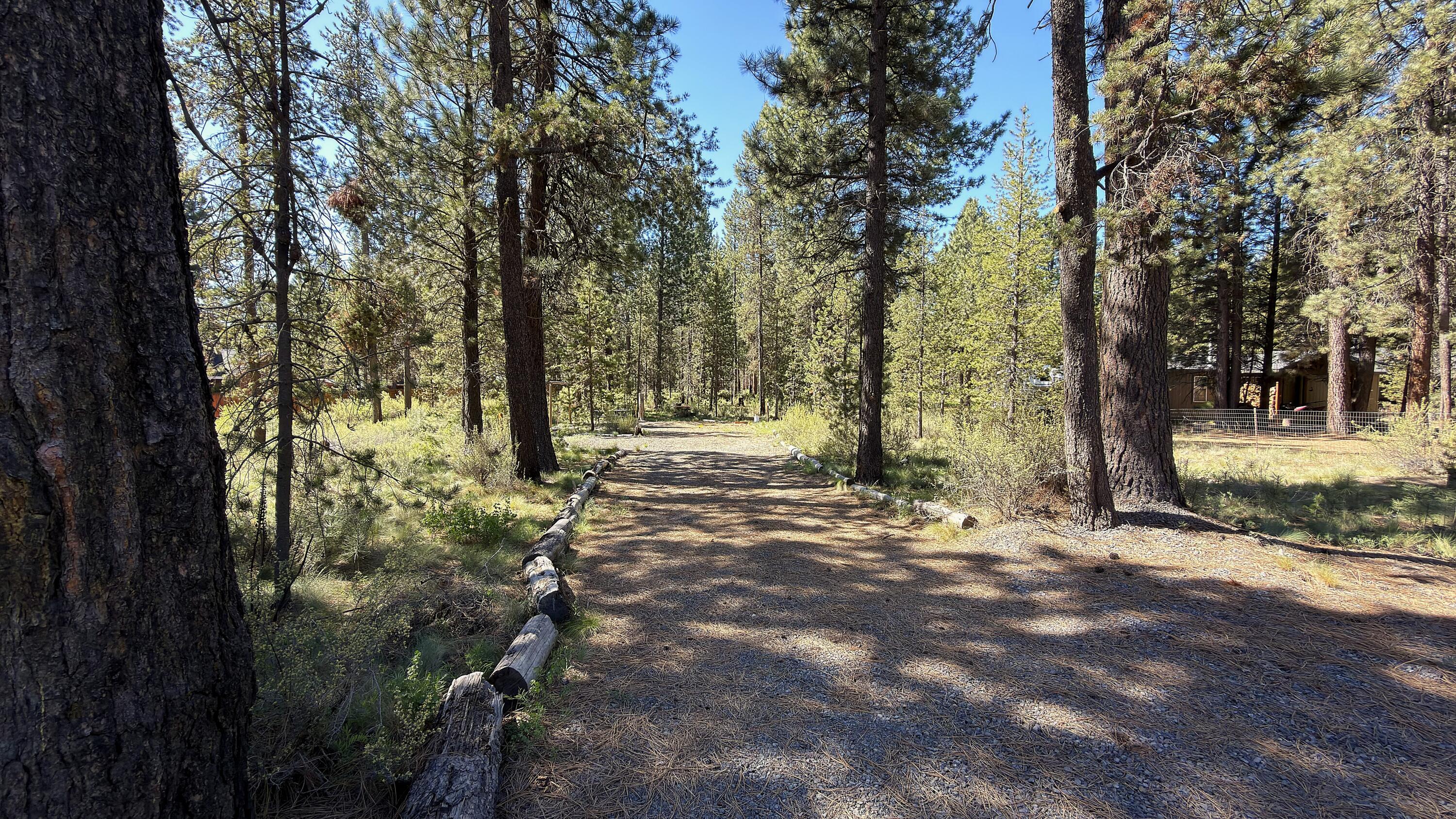 16999 Jacinto Road Bend, OR 97707 - Photo 18 of 38 a view of outdoor space with trees