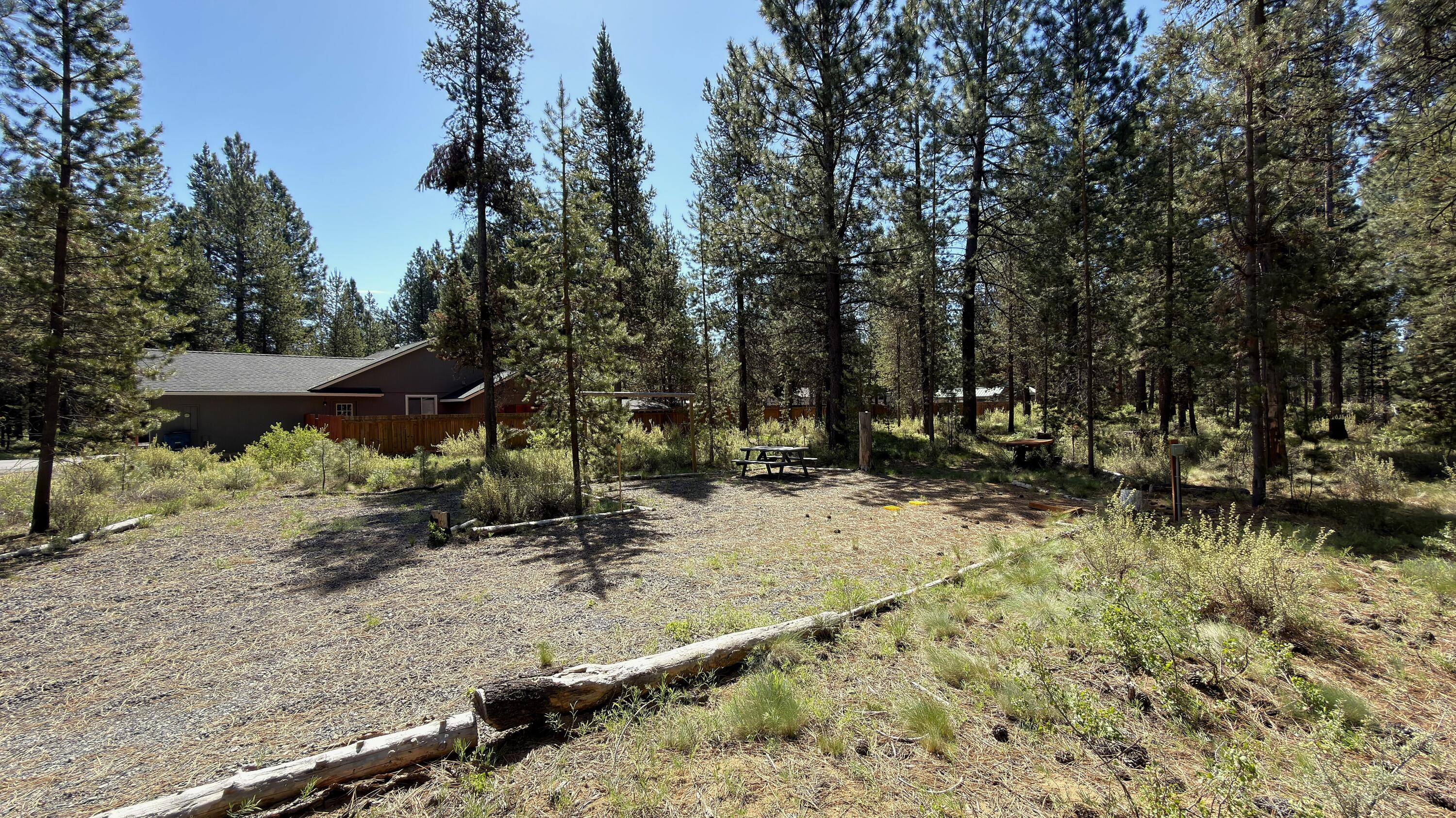 16999 Jacinto Road Bend, OR 97707 - Photo 2 of 38 a view of a backyard of the house