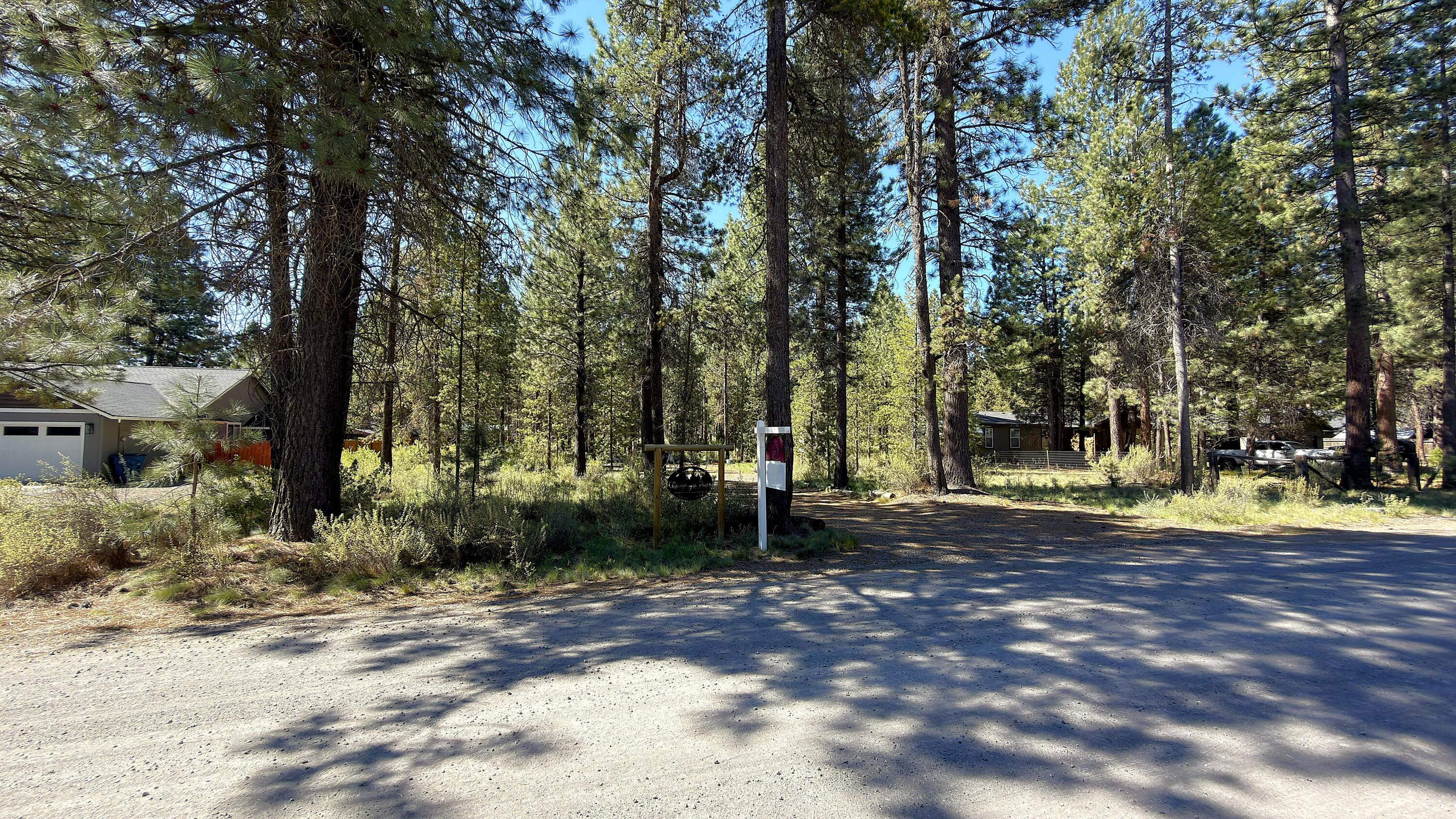 16999 Jacinto Road Bend, OR 97707 - Photo 23 of 38 a view of a park with large trees