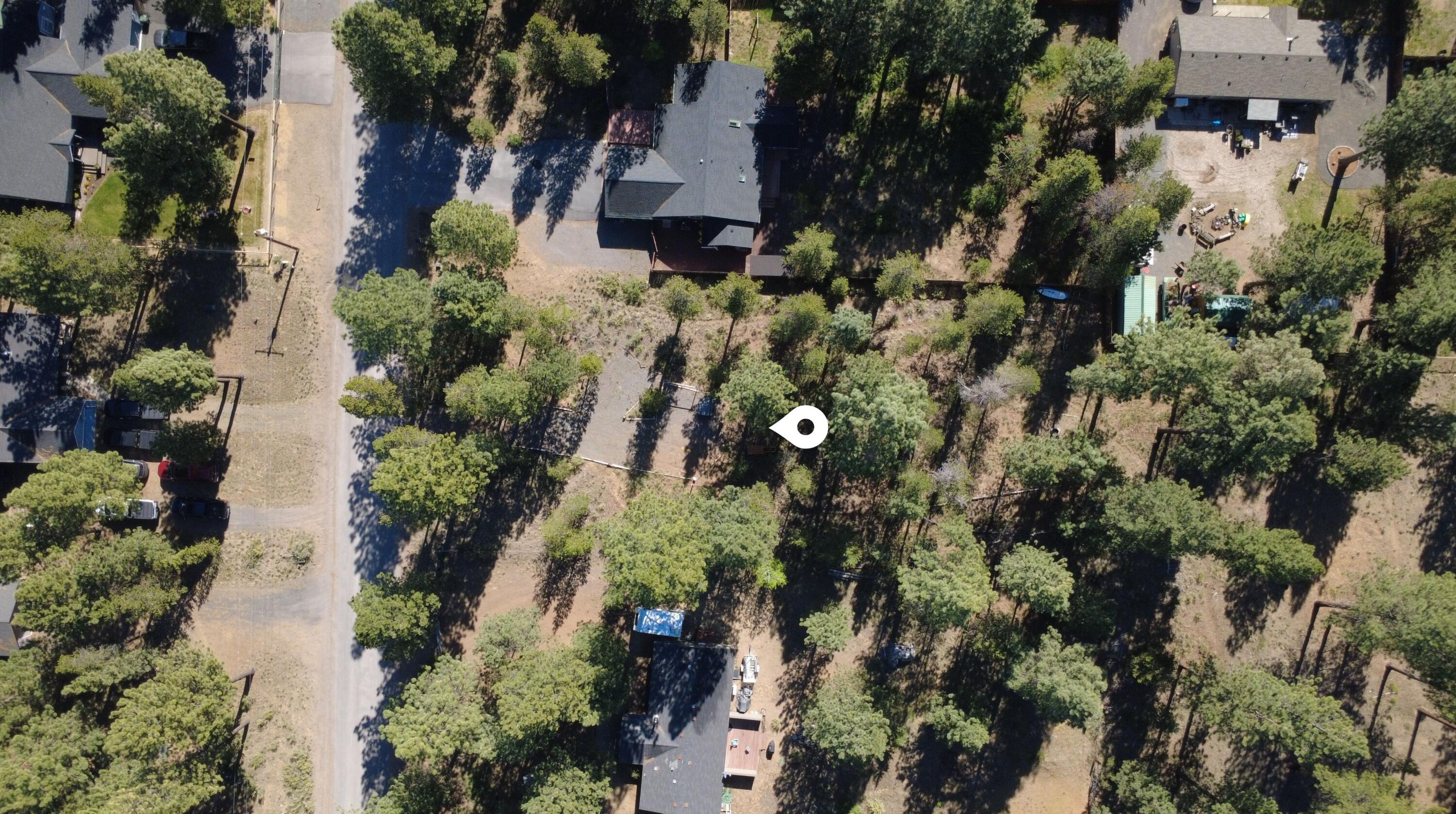 16999 Jacinto Road Bend, OR 97707 - Photo 29 of 38 an aerial view of a residential houses with outdoor space and street view