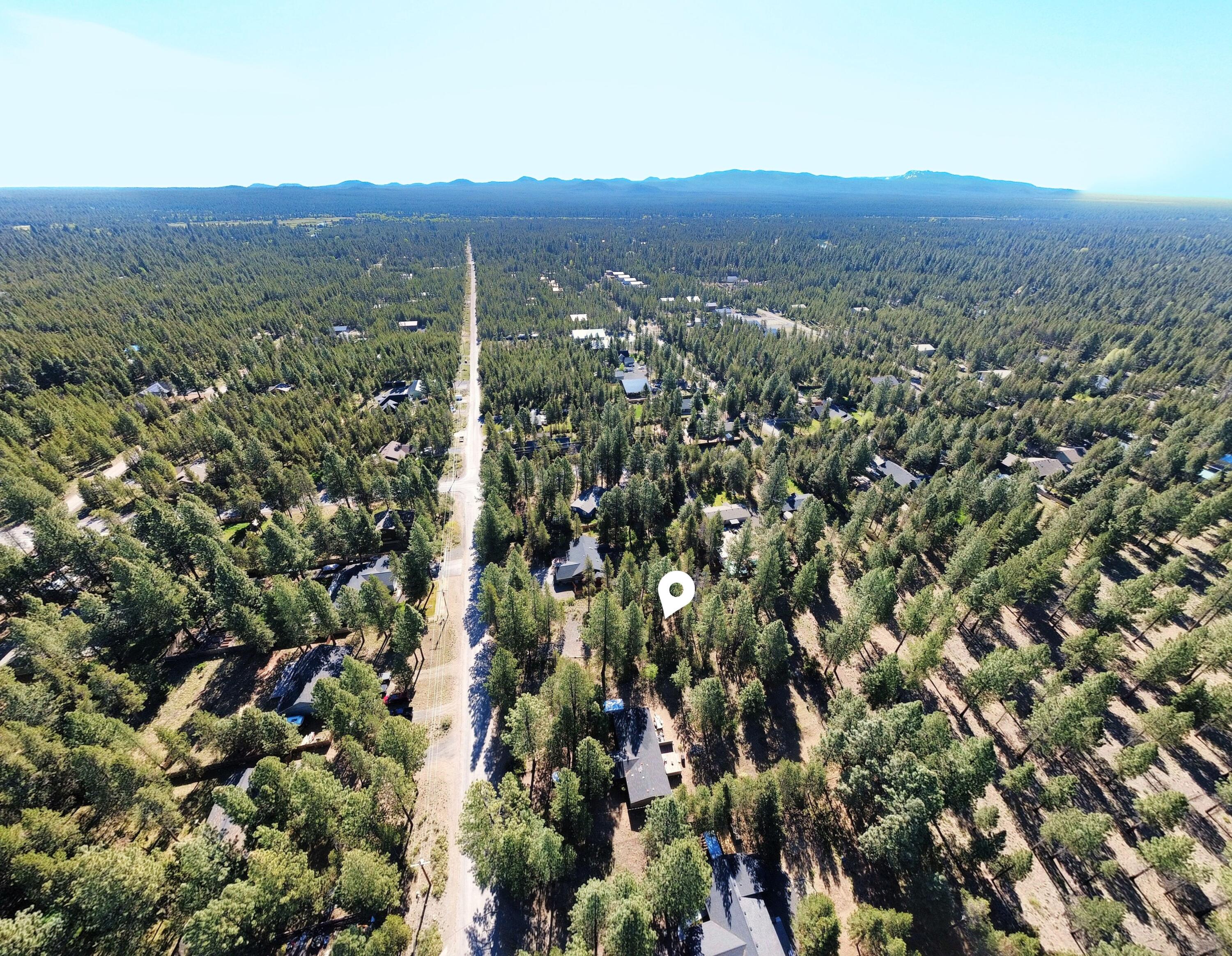 16999 Jacinto Road Bend, OR 97707 - Photo 31 of 38 an aerial view of town with residential houses and city view