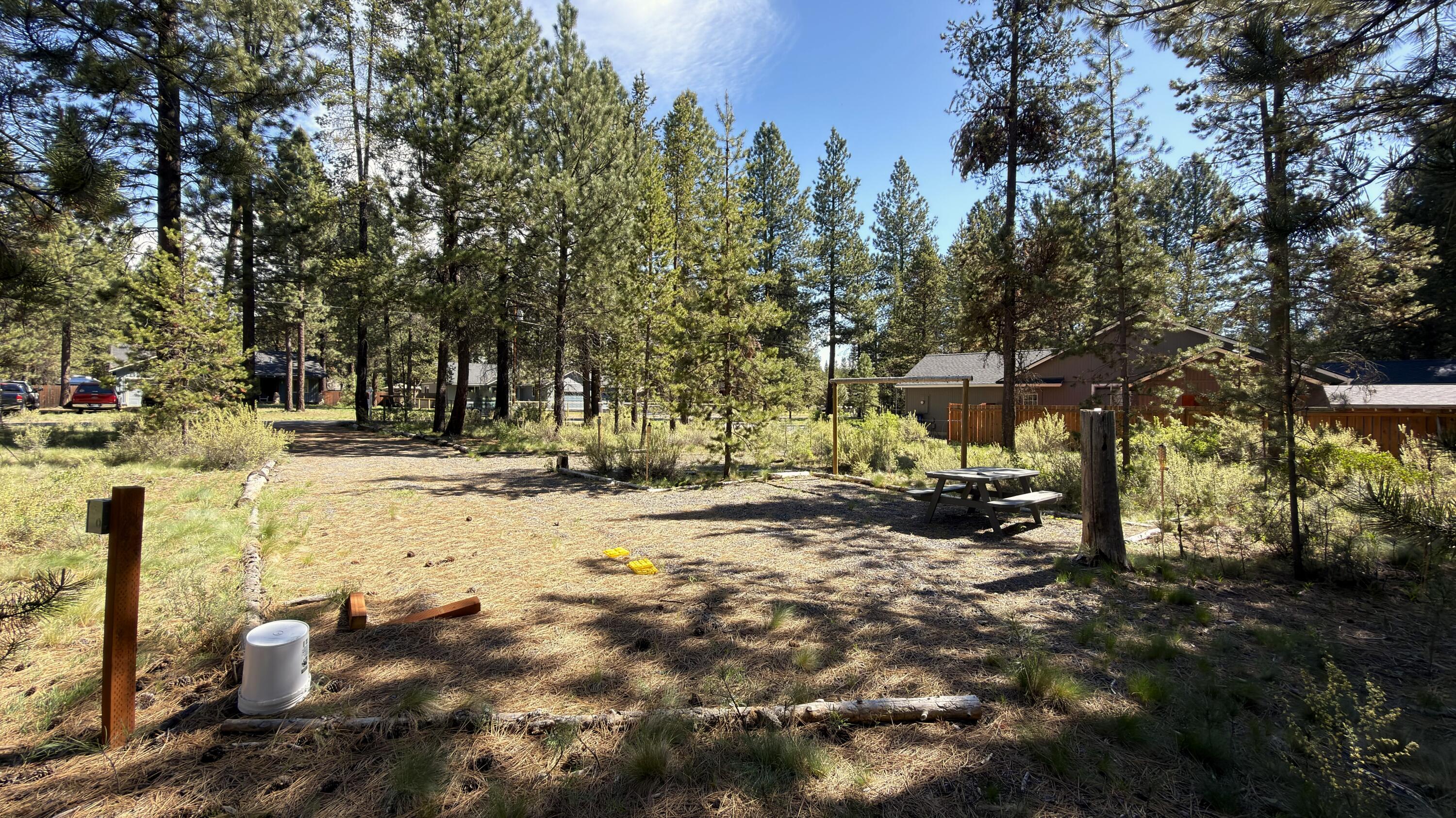 16999 Jacinto Road Bend, OR 97707 - Photo 4 of 38 a view of road with trees